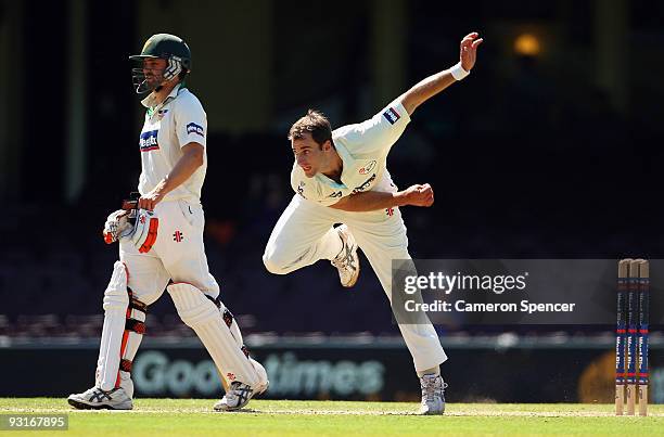 Burt Cockley of the Blues bowls during day two of the Sheffield Shield match between the New South Wales Blues and the Tasmanian Tigers at Sydney...