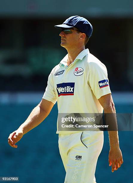 Stuart Clark of the Blues walks back to his position during day two of the Sheffield Shield match between the New South Wales Blues and the Tasmanian...