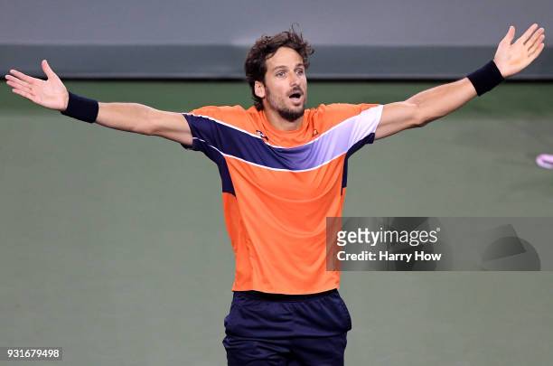 Feliciano Lopez of Spain celebrates victory over Jack Sock of the United States during the BNP Paribas Open at the Indian Wells Tennis Garden on...