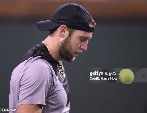 Jack Sock of the United States watches the ball bounce in his loss to Feliciano Lopez of Spain during the BNP Paribas Open at the Indian Wells Tennis...