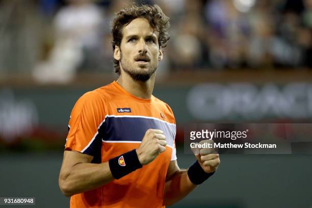 Feliciano Lopez of Spain celebrates his win over Jack Sock during the BNP Paribas Open at the Indian Wells Tennis Garden on March 13, 2018 in Indian...
