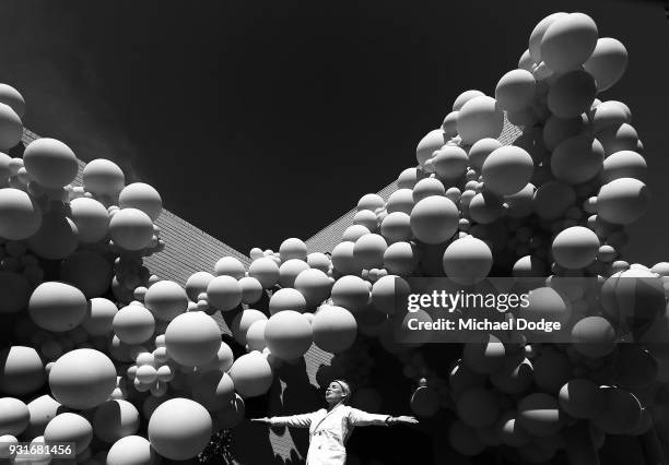 Balloon designer Jihan Zencirli, aka Geronimo, poses with her installation for Melbourne Design Week 2018 on March 14, 2018 in Melbourne, Australia....