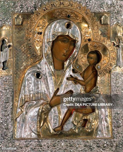 Madonna and Child, icon, oil panel with chiselled silver-gilt and colored stones Central Russia, 19th century.