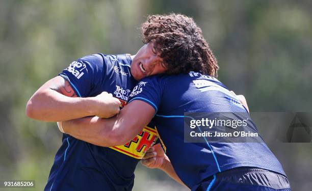 Kevin Proctor wrestles during a Gold Coast Titans NRL training session at Parkwood on March 14, 2018 in Gold Coast, Australia.