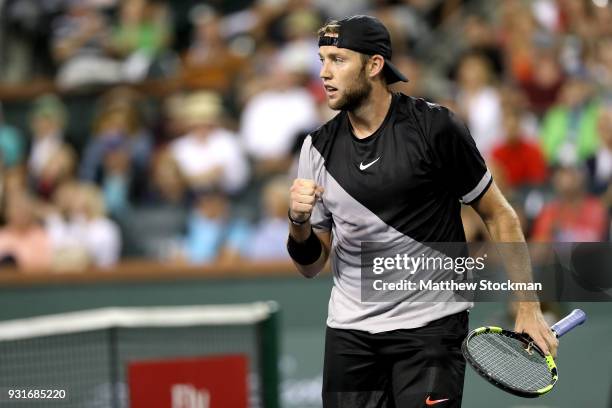 Jack Sock celebrates while playing Feliciano Lopez of Spain during the BNP Paribas Open at the Indian Wells Tennis Garden on March 13, 2018 in Indian...