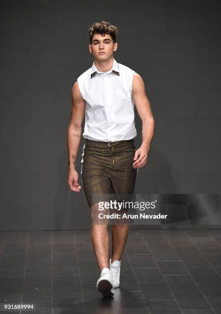 Model walks the runway wearing Jonathan Marc Stein at Los Angeles Fashion Week Powered by Art Hearts Fashion LAFW FW/18 10th Season Anniversary at...