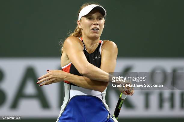 Caroline Wozniacki of Denmark plays Daria Kasatkina of Russia during the BNP Paribas Open at the Indian Wells Tennis Garden on March 13, 2018 in...