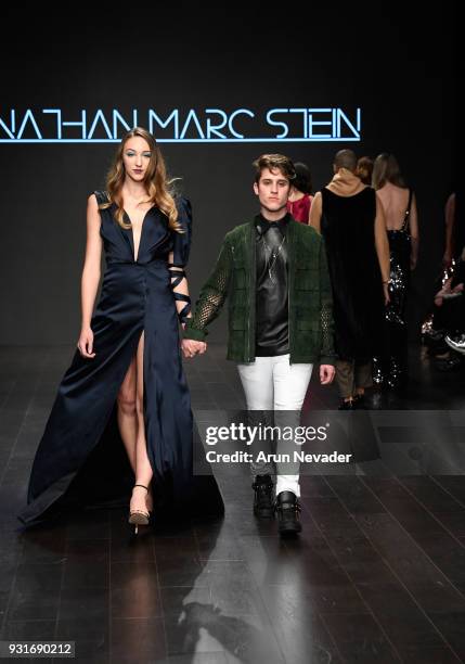 Designer Jonathan Marc Stein walks the runway with a model at Los Angeles Fashion Week Powered by Art Hearts Fashion LAFW FW/18 10th Season...
