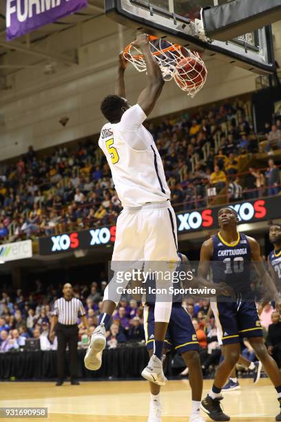 East Tennessee State Buccaneers center Peter Jurkin scores with a slam dunk during the second half of the college basketball game between...