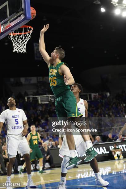 Vermont Catamounts forward Payton Henson shoots a easy lay up during the third quarter of the NIT first round basketball game between the University...