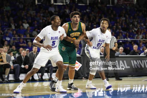 Vermont Catamounts forward Anthony Lamb fights for position after a free throw during the third quarter of the NIT first round basketball game...