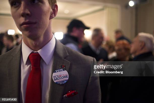 Supporter wears a campaign pin at an election night rally with Rick Saccone, Republican candidate for the U.S. House of Representatives, not...