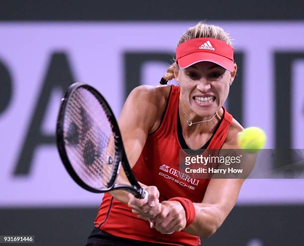 Angelique Kerber of Germany returns a backhand in her match against Caroline Garcia of France during the BNP Paribas Open at the Indian Wells Tennis...
