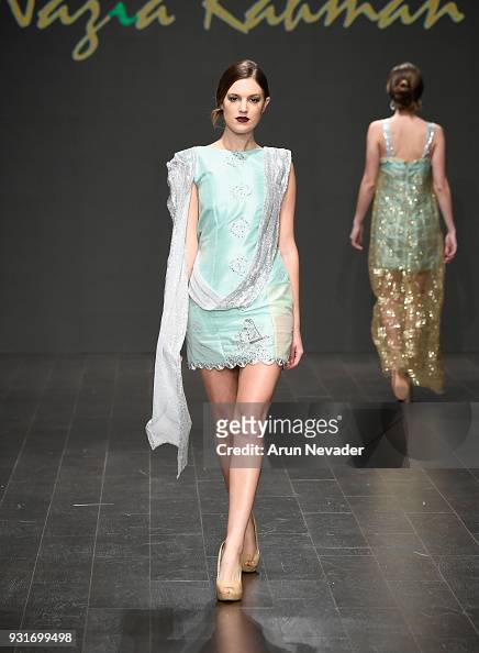 A model walks the runway wearing Nazia Rahman at Los Angeles Fashion ...