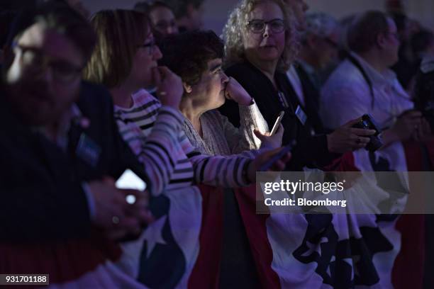 Attendees wait during an election night rally with Conor Lamb, Democratic candidate for the U.S. House of Representatives, not pictured, in...