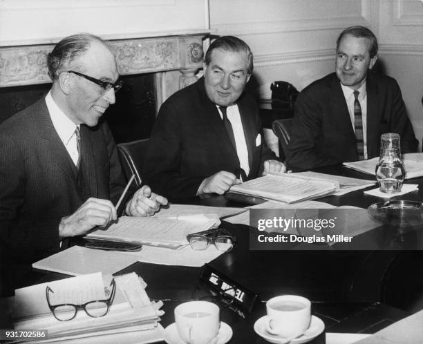 From left to right, Sir Philip Allen , Permanent Under-Secretary of State at the Home Office, Home Secretary James Callaghan and Dick Taverne, Joint...