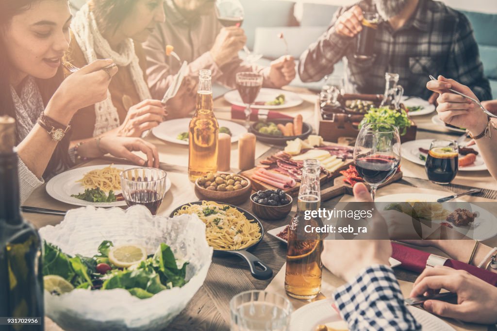 Group of people having meal togetherness dining