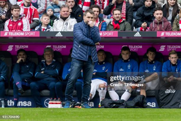 Head coach Bernd Hollerbach of Hamburg looks on during the Bundesliga match between FC Bayern Muenchen and Hamburger SV at Allianz Arena on March 10,...