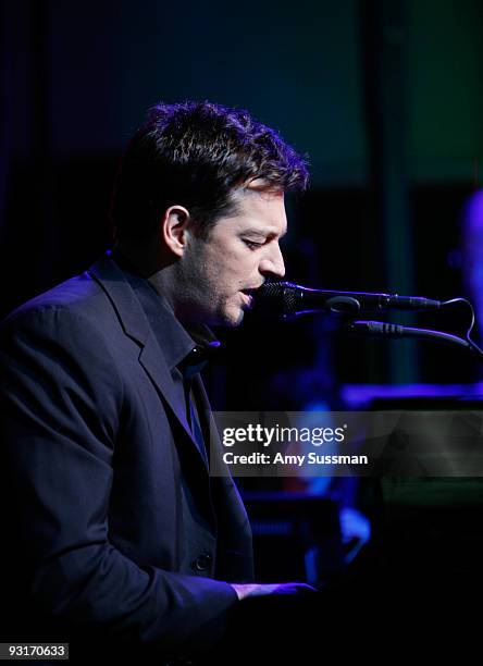 Singer Harry Connick, Jr performs at the 2009 holiday windows unveiling at Bloomingdale's on November 17, 2009 in New York City.