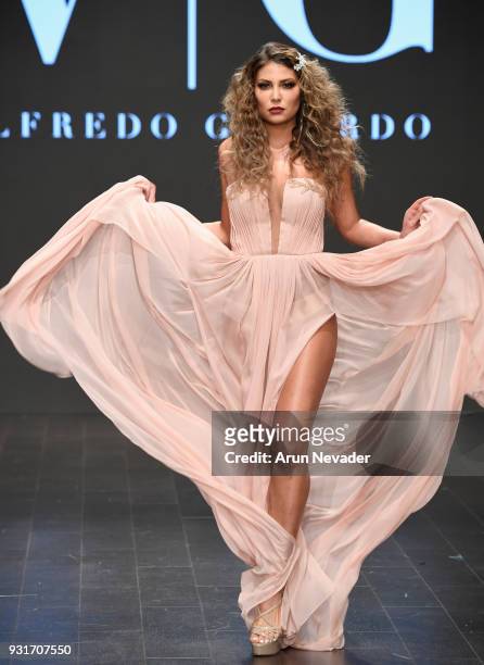 Model walks the runway wearing Willfredo Gerardo at Los Angeles Fashion Week Powered by Art Hearts Fashion LAFW FW/18 10th Season Anniversary at The...
