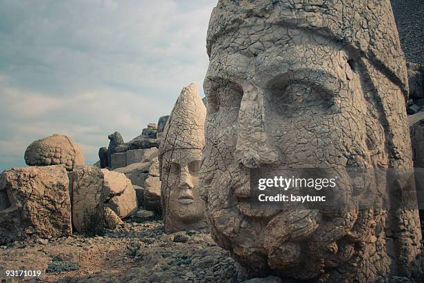 close up of statues of nemrud dagh - nemrut dag stock pictures, royalty-free photos & images