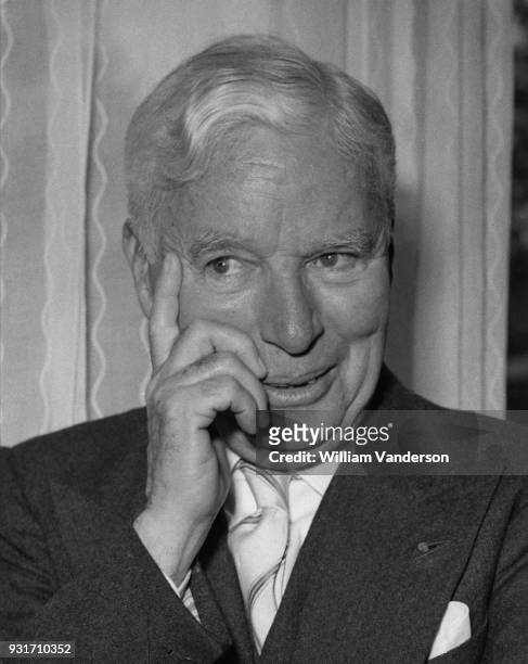 English actor and filmmaker Charlie Chaplin during a photocall at the Savoy Hotel in London, 10th September 1957. He is in the capital to attend the...