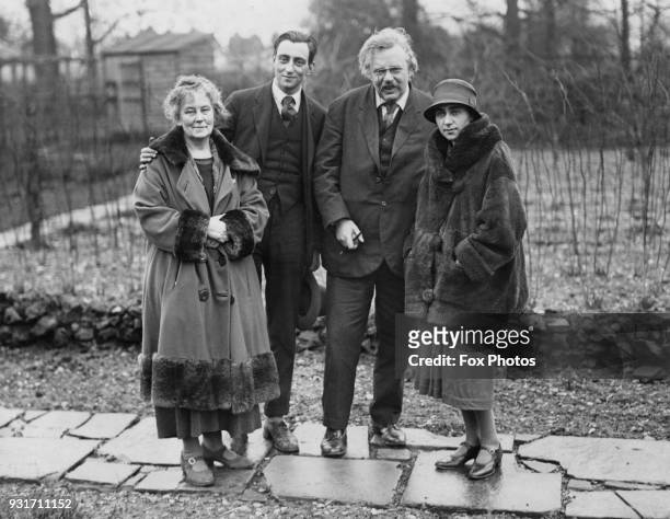 English writer G. K. Chesterton at his home in Beaconsfield, UK, with his wife, writer Frances Blogg , February 1926.