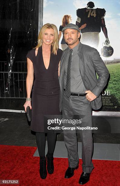 Singer Faith Hill and husband Tim McGraw attend "The Blind Side" premiere at the Ziegfeld Theatre on November 17, 2009 in New York City.