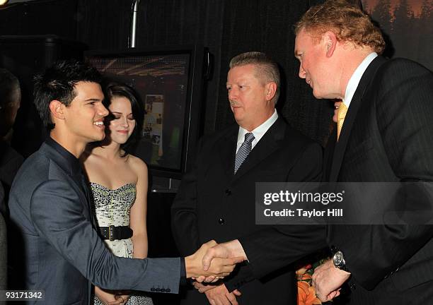 Taylor Lautner, Kristen Stewart, Mike Campbell and Greg Dunn attend the New Moon's Regal Benefit screening at Regal Cinemas the Pinnacle 18 on...