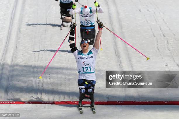 Oksana Masters of United States celebrates in the Cross-Country Skiing - Women's 1.1km Sprint Final, Sitting on day five of the PyeongChang 2018...