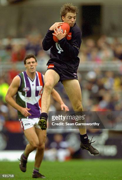Matthew Lappin of Carlton takes a mark, during the round 16 AFL game between the Carlton Blues and the Fremantle Dockers, played at Optus Oval in...