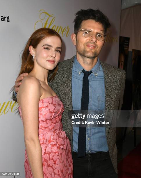 Actress Zoey Deutch and actor Adam Scott arrive at the premiere of The Orchard's "Flower" at the Arclight Theatre on March 13, 2018 in Los Angeles,...