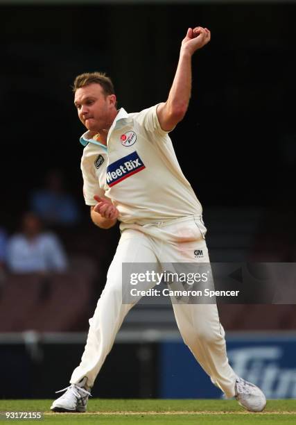 Doug Bollinger of the Blues fields during day two of the Sheffield Shield match between the New South Wales Blues and the Tasmanian Tigers at Sydney...