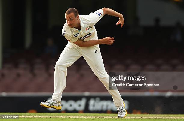 Stuart Clark of the Blues bowls during day two of the Sheffield Shield match between the New South Wales Blues and the Tasmanian Tigers at Sydney...