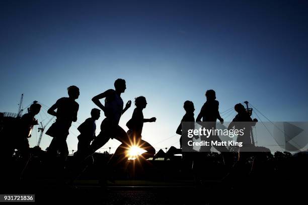 Competitors race in the Men's 5000 Metre Run Under 20 during day one of the Australian Junior Athletics Championships at Sydney Olympic Park...