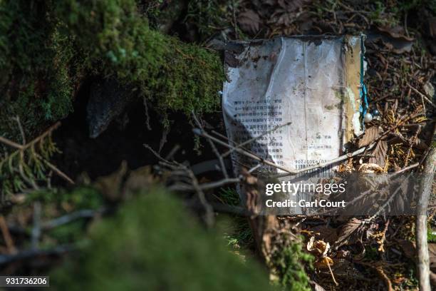 Book remains at the scene of an apparent suicide in Aokigahara forest on March 13, 2018 in Fujikawaguchiko, Japan. Aokigahara forest lies on the on...