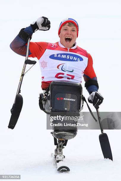 Jesper Pedersen of Norway celebrates at the victory ceremony for Men's Giant Slalom Run - Sitting at Alpensia Biathlon Centre on day five of the...