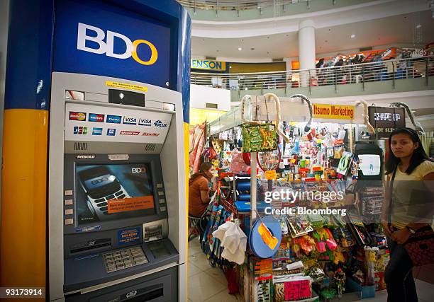 Banco de Oro Unibank Inc. Automated teller machine stands inside the Circle C shopping mall in Quezon City, Metro Manila, the Philippines, on...