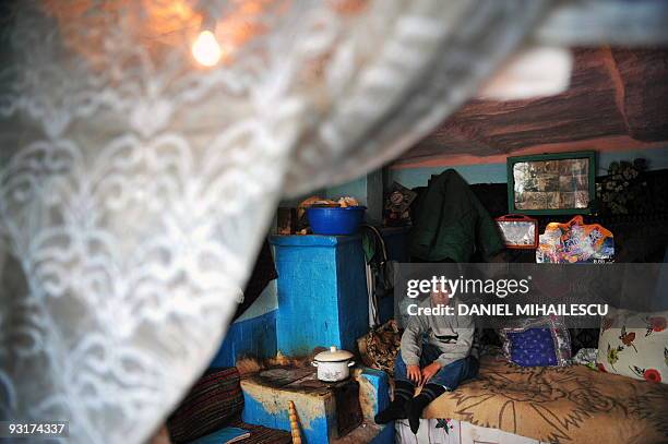 Isabelle Wesselingh Andrei Atomulesei sits in his house in the village of Raducaneni, 350km northeast from Bucharest on November 12, 2009. Constantin...