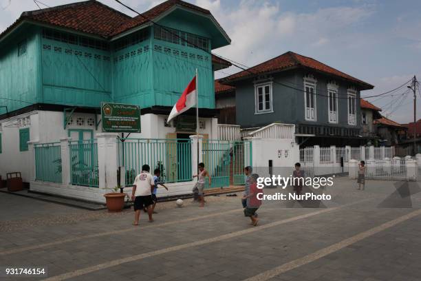 The kids were playing football in Al-Munawar Arabic village. Al Munawar village is a settlement inhabited by people of Arab descent located on the...