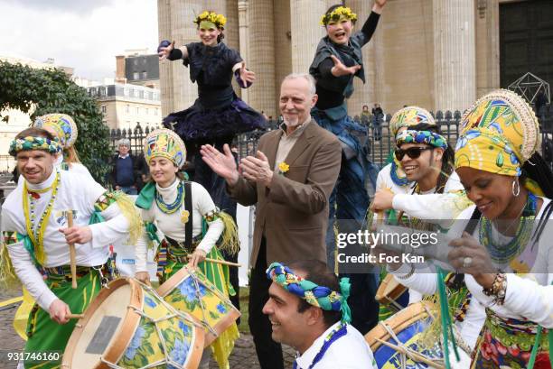 Tom Novembre and a creole orchestra perform during Une Jonquille pour Institut Marie Curie Place du Pantheon on March 13, 2018 in Paris, France.