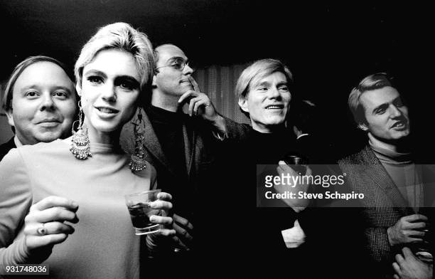 Portrait of, from left, American art critic and curator Henry Geldzahler , fashion model & actress Edie Sedgwick , actor and producer Fu-Fu Smith ,...