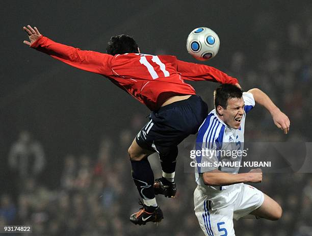 Edson Puch of Chile fights for the ball with Slovakia's Radoslav Zabavnik during their friendly match in Zilina on November 17, 2009. AFP PHOTO /...