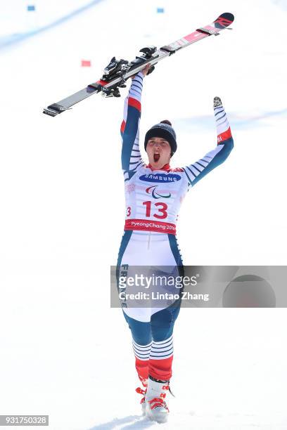 Gold Medalist Marie Bochet of France celebrates at the victory ceremony for Women's Giant Slalom Run 2 - Standing at Alpensia Biathlon Centre on day...