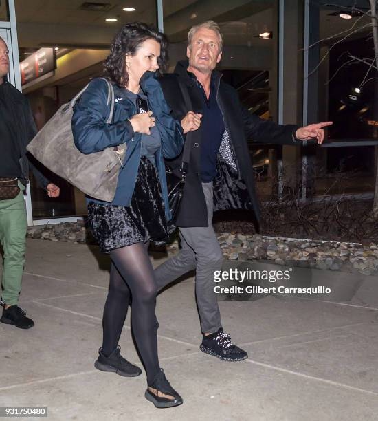 Actor Dolph Lundgren and Jenny Sandersson are seen arriving to Philadelphia International Airport on March 13, 2018 in Philadelphia, Pennsylvania.