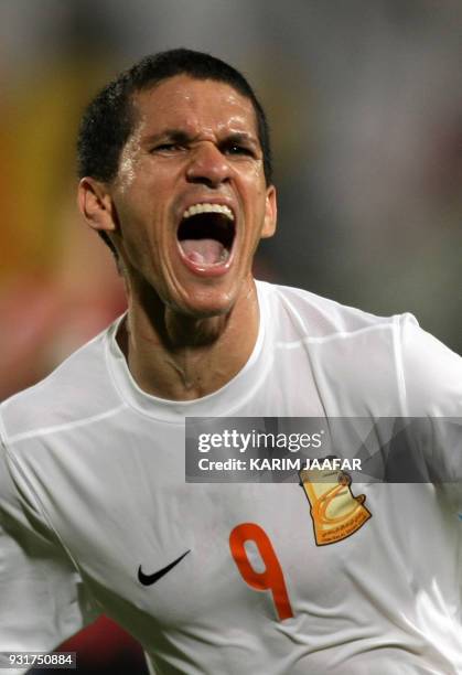 Umm Salal's Brazilian striker Magno Alves a celebrates after scoring third goal against South Korea's FC Seoul club during their AFC Champions League...