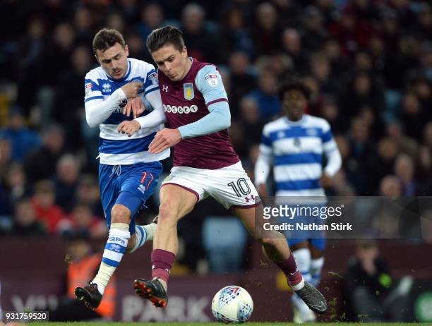 Jack Grealish of Aston Villa and of Josh Scowen of Queens Park Rangers in action during the Sky Bet Championship match between Aston Villa and Queens...
