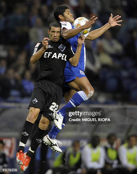 Porto's Brazilian Givanildo de Souza "Hulk" vies with Academica's Emidio Rafael da Silva during their Portuguese league football match at the Dragao...