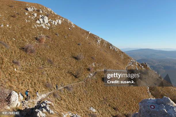 family hiking on mountain on clear day. - overmountain victory national historic trail stock pictures, royalty-free photos & images