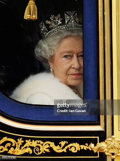 Queen Elizabeth II returns to Buckingham Palace in a carriage from the Houses of Parliament following the State Opening of Parliament on November 18,...